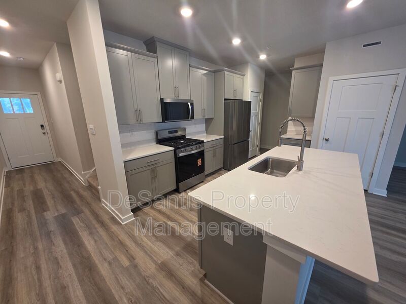 Luxury 4-Bedroom Townhome with Finished Walkout Basement & River Views property image