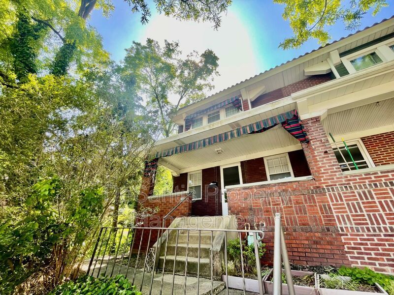 Charming Pittsburgh Retreat: 3-Bed Home with Hardwood Floors, Basement, and Private Porches property image