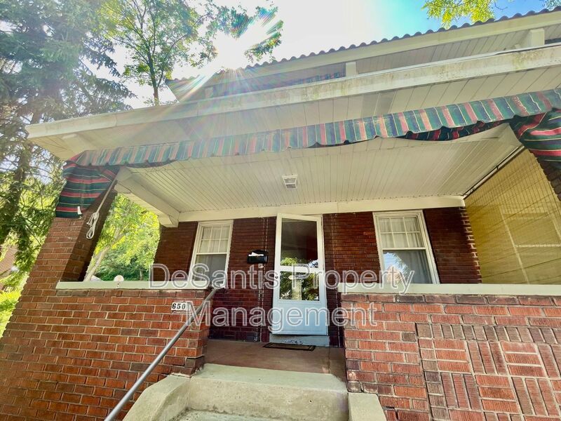Charming Pittsburgh Retreat: 3-Bed Home with Hardwood Floors, Basement, and Private Porches property image