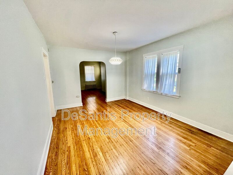 Charming Pittsburgh Retreat: 3-Bed Home with Hardwood Floors, Basement, and Private Porches property image