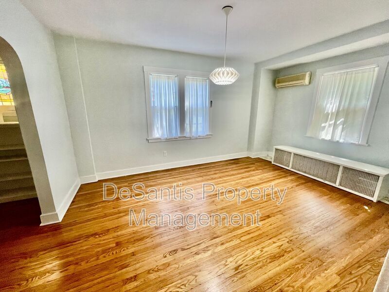 Charming Pittsburgh Retreat: 3-Bed Home with Hardwood Floors, Basement, and Private Porches property image