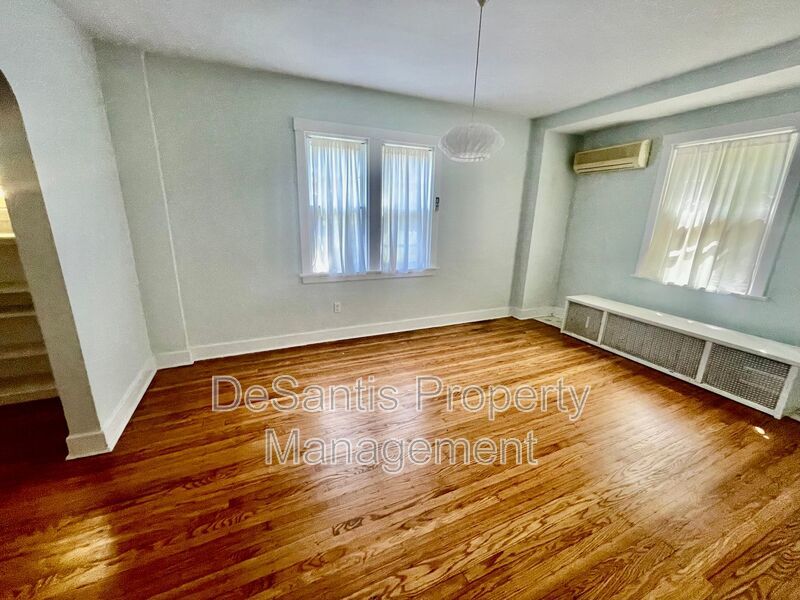 Charming Pittsburgh Retreat: 3-Bed Home with Hardwood Floors, Basement, and Private Porches property image