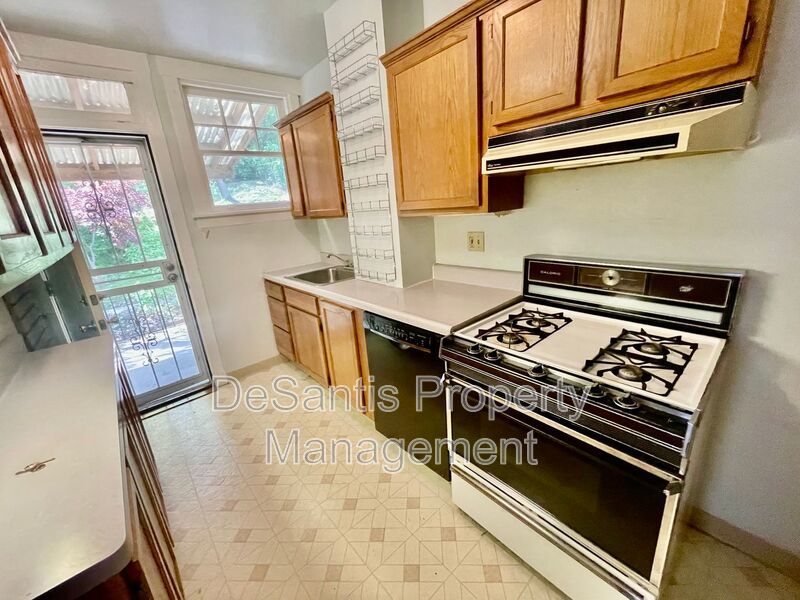 Charming Pittsburgh Retreat: 3-Bed Home with Hardwood Floors, Basement, and Private Porches property image