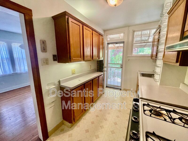 Charming Pittsburgh Retreat: 3-Bed Home with Hardwood Floors, Basement, and Private Porches property image