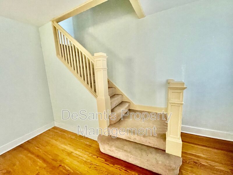Charming Pittsburgh Retreat: 3-Bed Home with Hardwood Floors, Basement, and Private Porches property image
