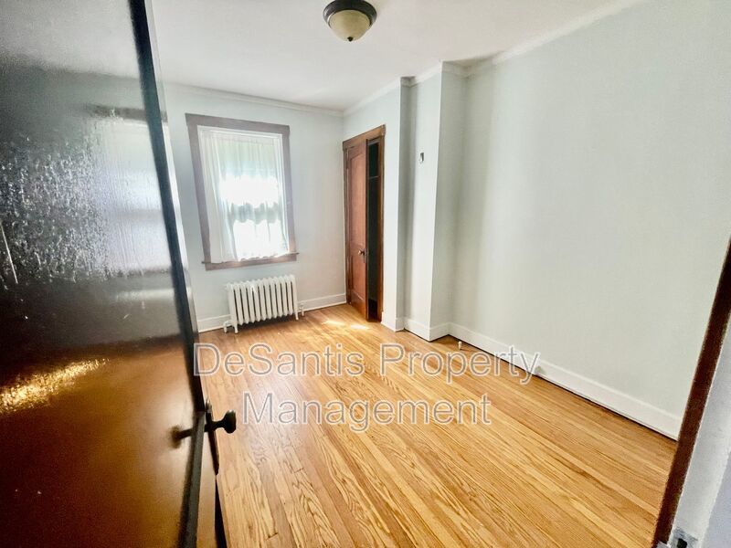 Charming Pittsburgh Retreat: 3-Bed Home with Hardwood Floors, Basement, and Private Porches property image