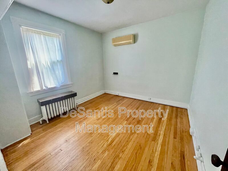 Charming Pittsburgh Retreat: 3-Bed Home with Hardwood Floors, Basement, and Private Porches property image