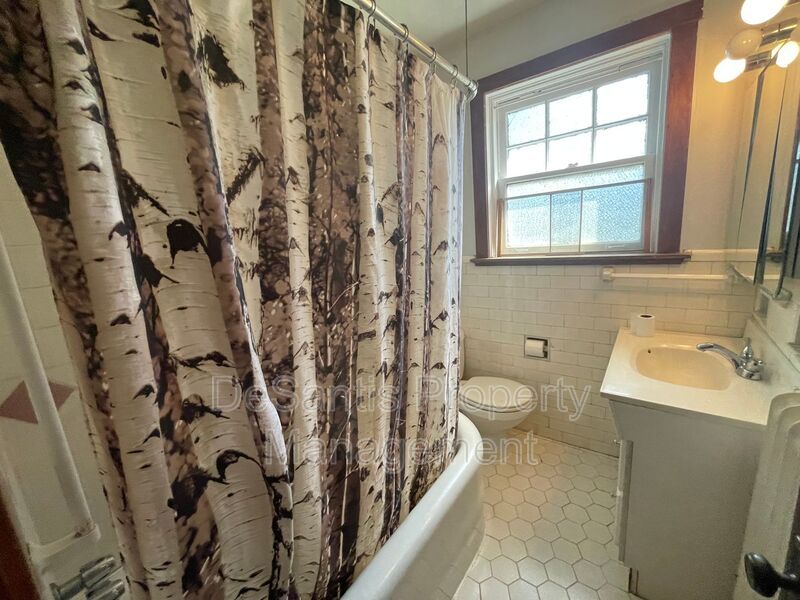 Charming Pittsburgh Retreat: 3-Bed Home with Hardwood Floors, Basement, and Private Porches property image