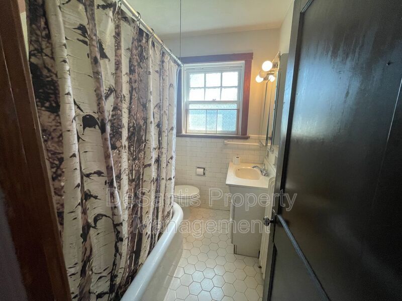 Charming Pittsburgh Retreat: 3-Bed Home with Hardwood Floors, Basement, and Private Porches property image