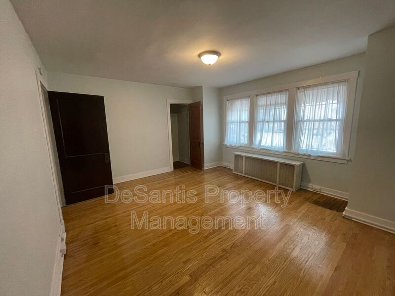 Charming Pittsburgh Retreat: 3-Bed Home with Hardwood Floors, Basement, and Private Porches property image