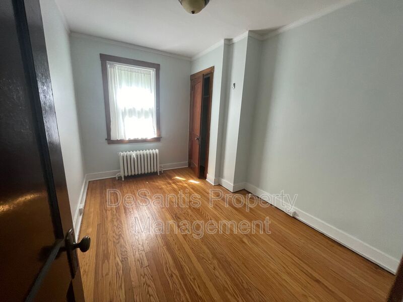 Charming Pittsburgh Retreat: 3-Bed Home with Hardwood Floors, Basement, and Private Porches property image