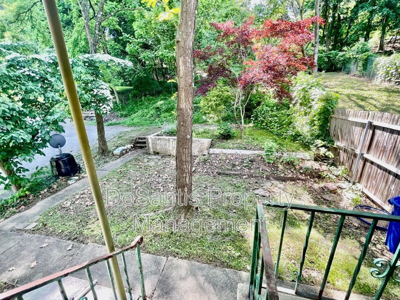 Charming Pittsburgh Retreat: 3-Bed Home with Hardwood Floors, Basement, and Private Porches property image