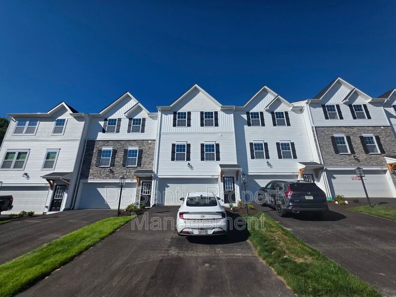 Brand-new townhome with modern finishes, flexible living space, and low-maintenance living. property image