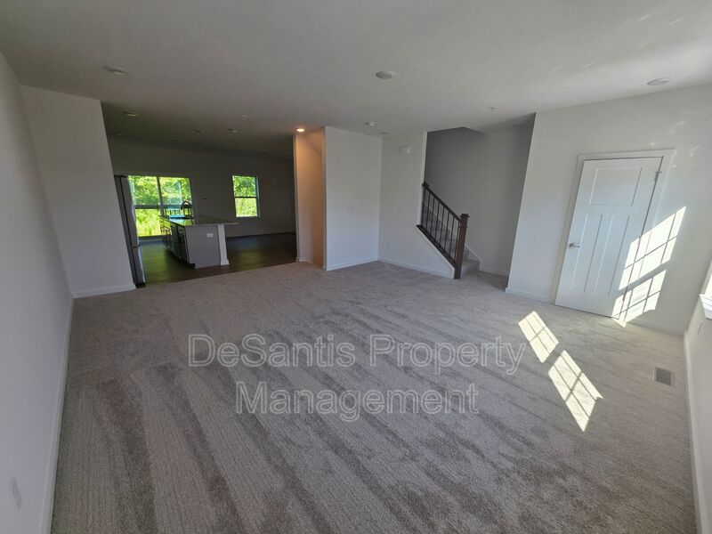 Brand-new townhome with modern finishes, flexible living space, and low-maintenance living. property image