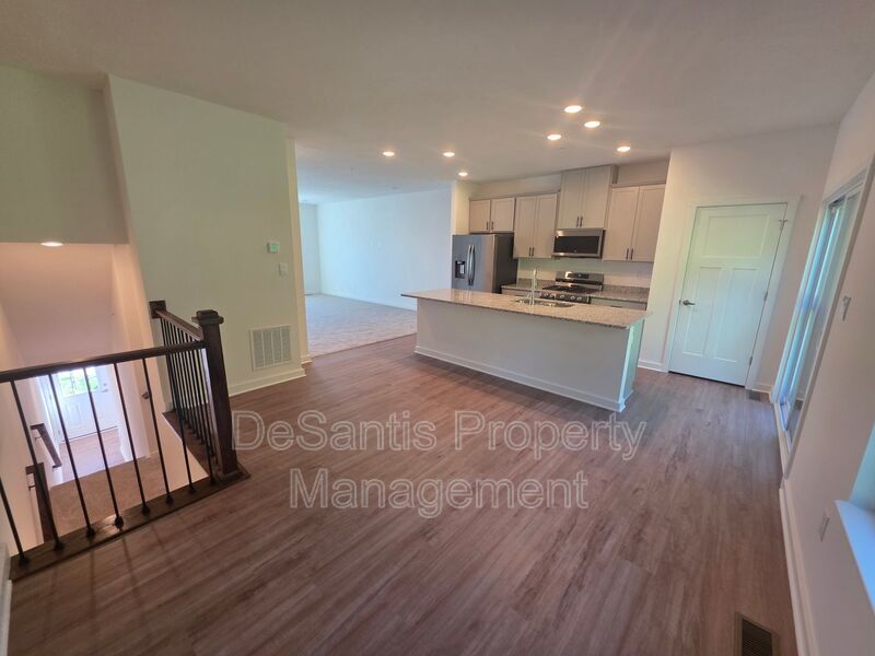 Brand-new townhome with modern finishes, flexible living space, and low-maintenance living. property image