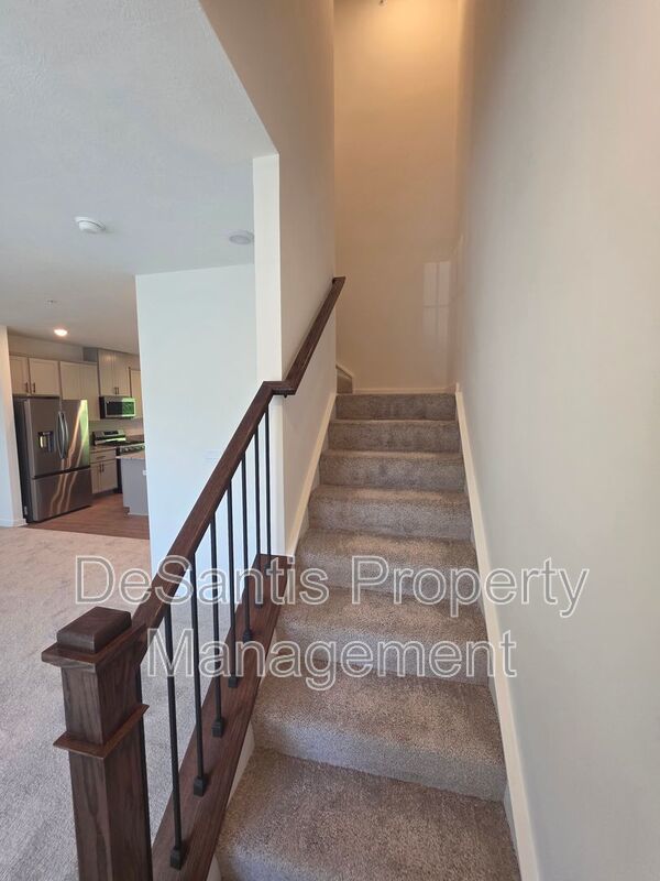 Brand-new townhome with modern finishes, flexible living space, and low-maintenance living. property image