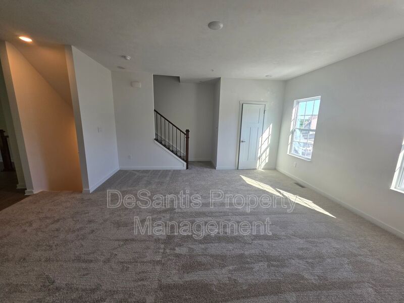Brand-new townhome with modern finishes, flexible living space, and low-maintenance living. property image