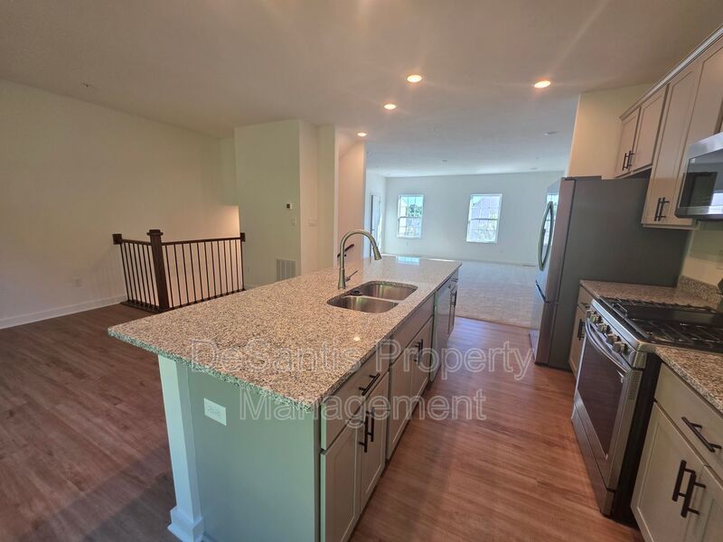 Brand-new townhome with modern finishes, flexible living space, and low-maintenance living. property image