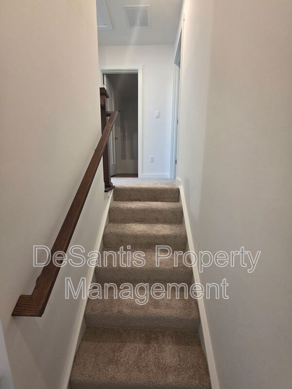Brand-new townhome with modern finishes, flexible living space, and low-maintenance living. property image