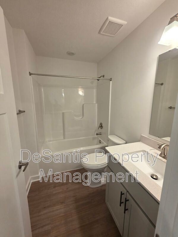 Brand-new townhome with modern finishes, flexible living space, and low-maintenance living. property image