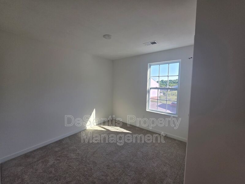 Brand-new townhome with modern finishes, flexible living space, and low-maintenance living. property image