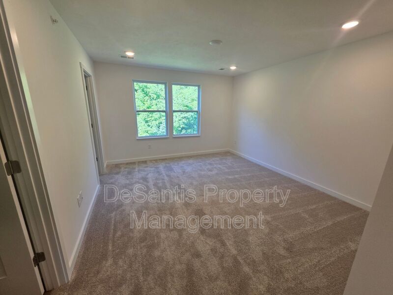Brand-new townhome with modern finishes, flexible living space, and low-maintenance living. property image