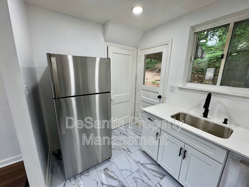 Adorable 2 Bed 1 Bath Home in Brookline W/dedicated office/library space! property image