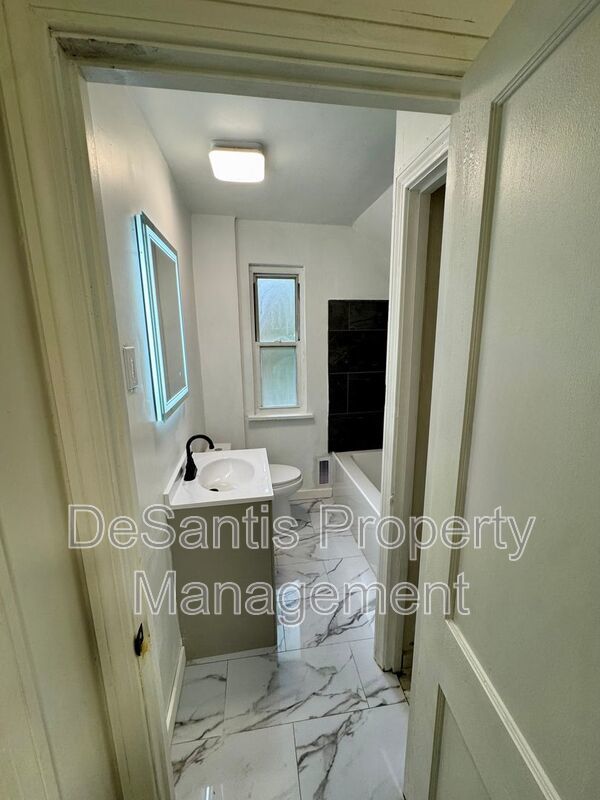 Adorable 2 Bed 1 Bath Home in Brookline W/dedicated office/library space! property image