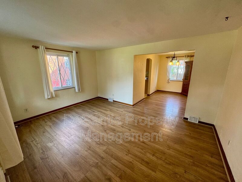 Spacious 4-Bedroom, 2-Bath Home with Classic Charm, Ample Parking & a Large Backyard! property image