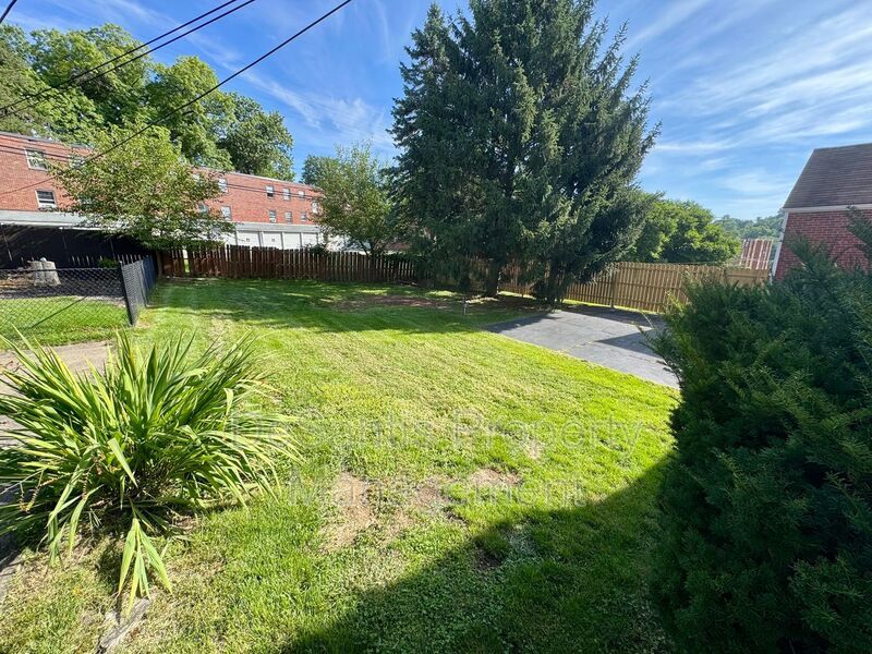 Spacious 4-Bedroom, 2-Bath Home with Classic Charm, Ample Parking & a Large Backyard! property image
