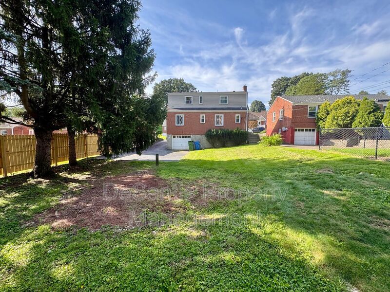 Spacious 4-Bedroom, 2-Bath Home with Classic Charm, Ample Parking & a Large Backyard! property image