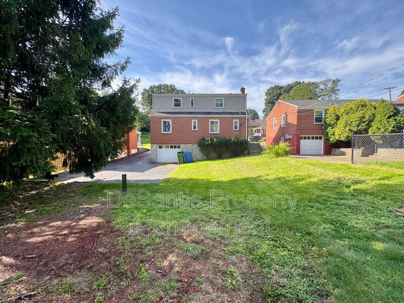 Spacious 4-Bedroom, 2-Bath Home with Classic Charm, Ample Parking & a Large Backyard! property image