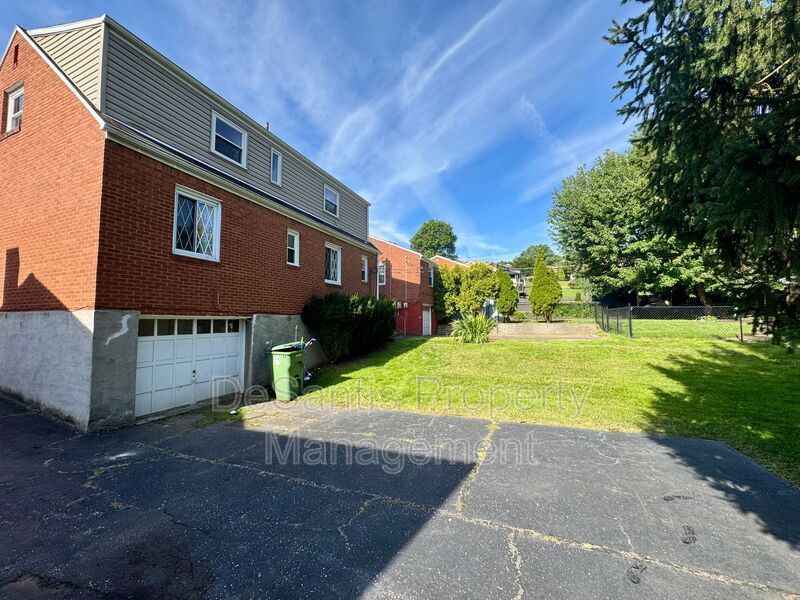 Spacious 4-Bedroom, 2-Bath Home with Classic Charm, Ample Parking & a Large Backyard! property image